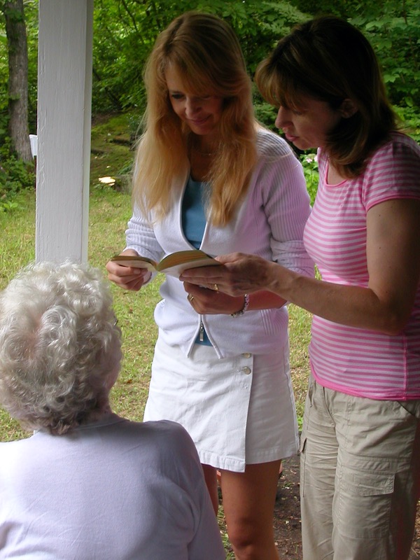 Lisa standing reading
