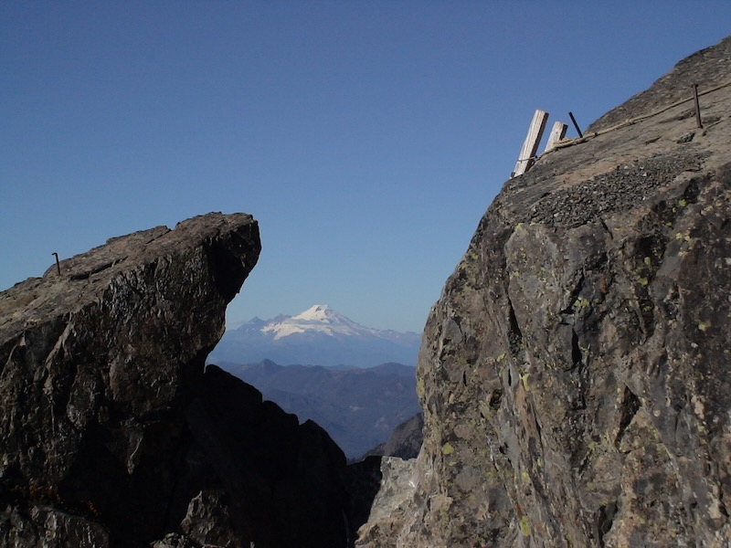 ladder top with distant mountain behind