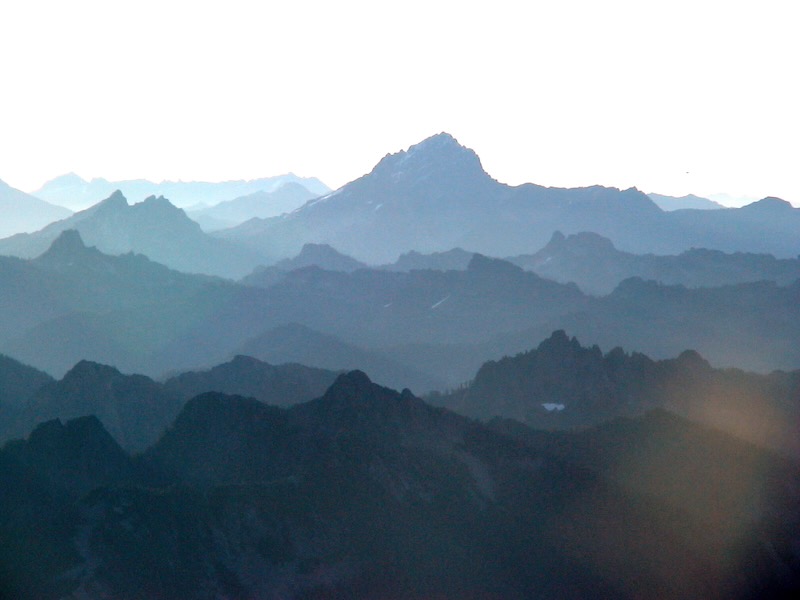 cascading peaks turning blue with distance