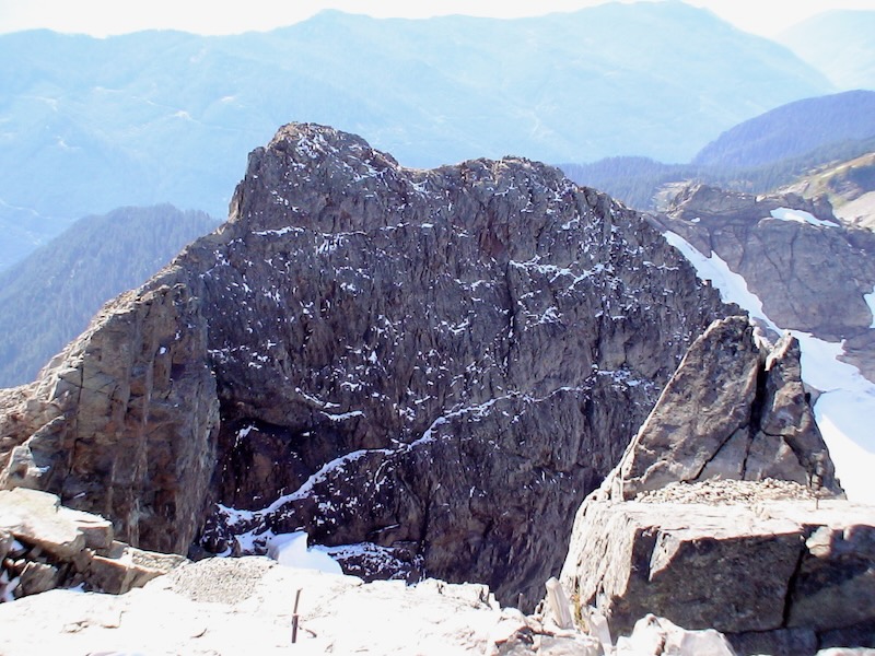 rock facing wall with snow pockets