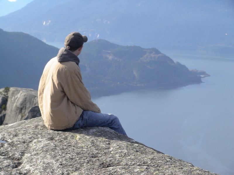 Austin sitting at rock edge