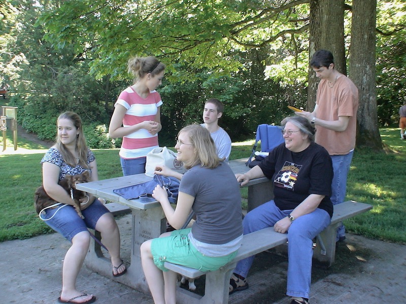 Sitting around a picnic table