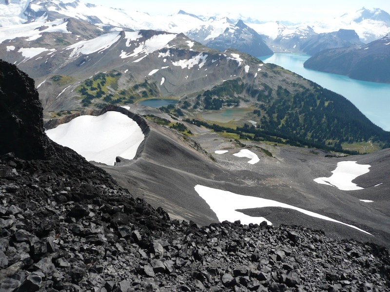rocks and lake beyond below