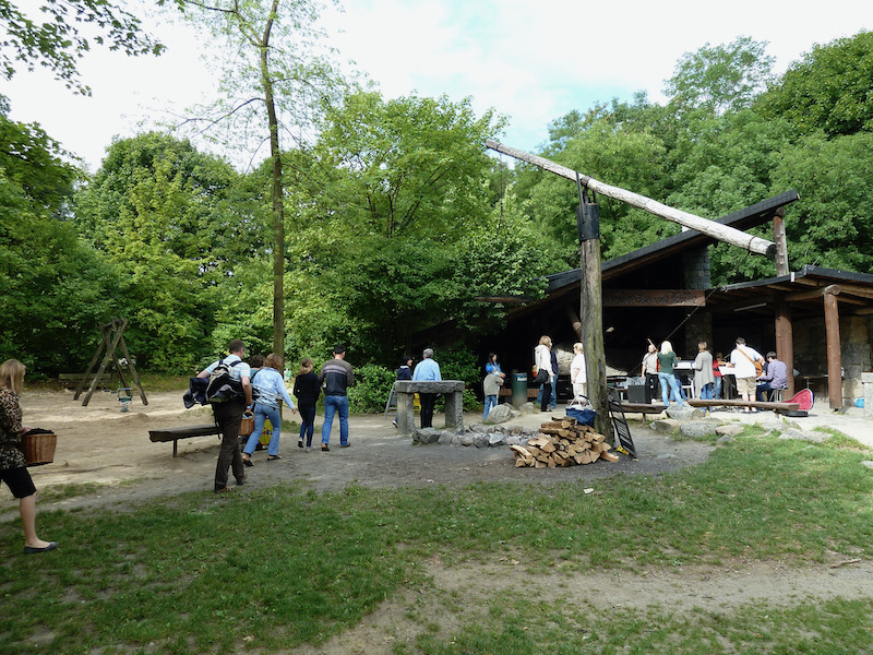 Park with cooking fire pit and covered area
