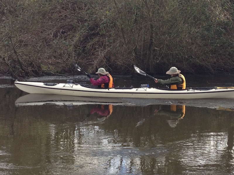 Larry & Melaine in tandem kayak sprinting