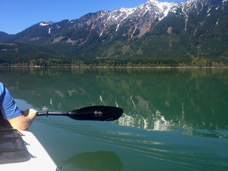 Paddle over water with mountain beyond