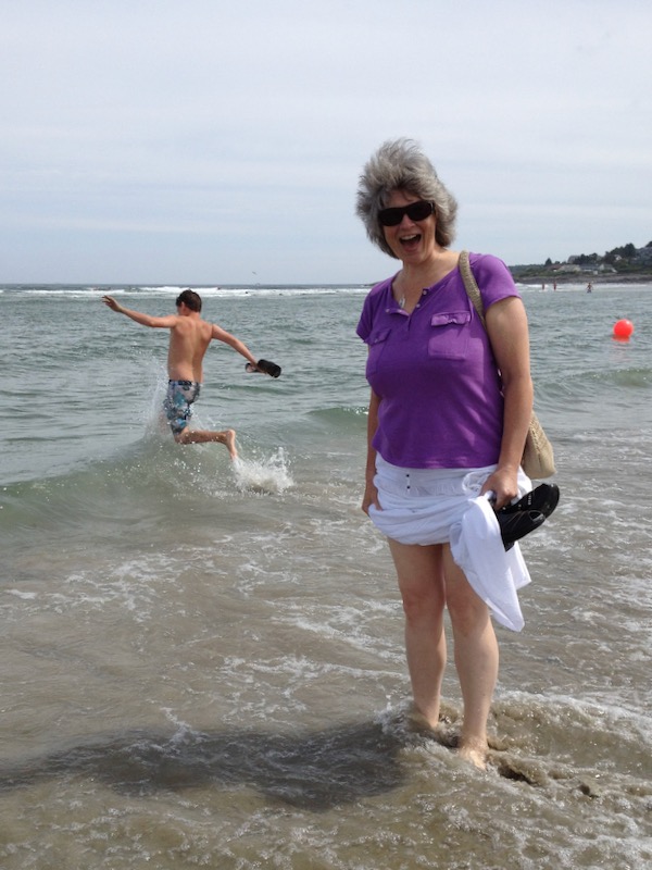 Melanie barefoot in the Atlantic