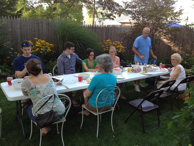 Tables in back yard with dinner