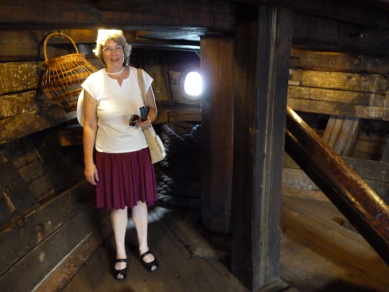 Melanie almost touching deck with head