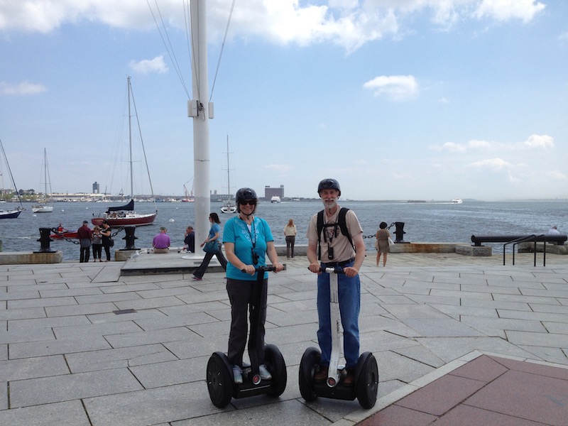 Larry Melanie on Segways at harbor
