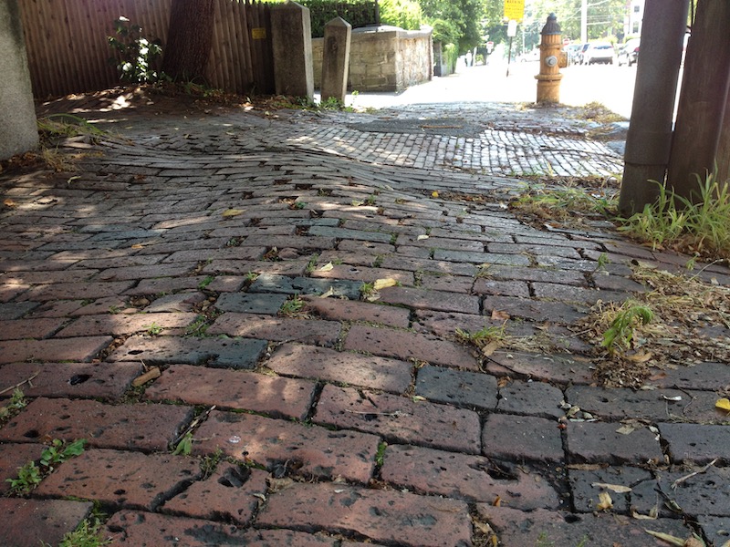 Wavey uneven brick sidewalk