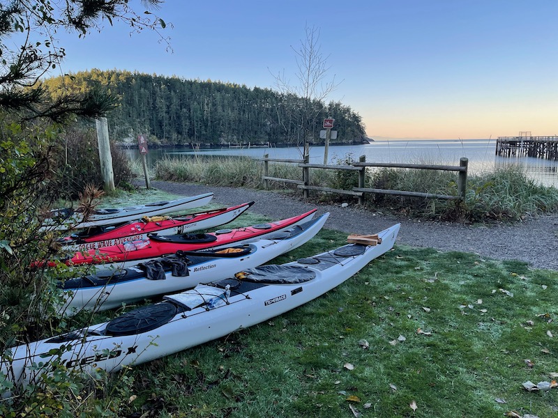 boats lined up by camp