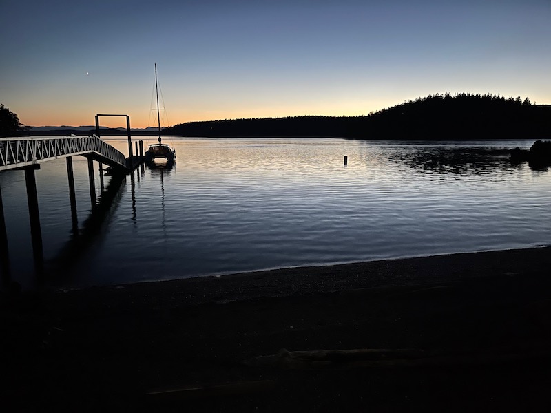 calm water lit by sunset