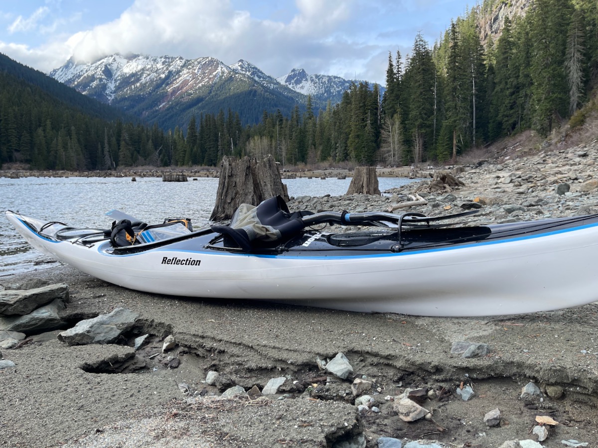 kayak with lake and mountains