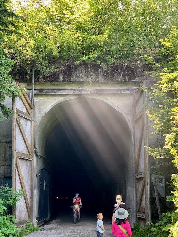 east opening of tunnel with sun beams