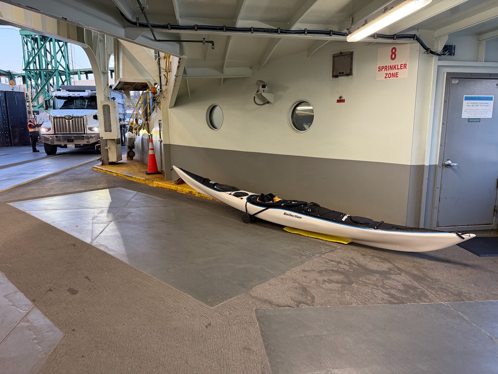 kayak stowed at back on ferry