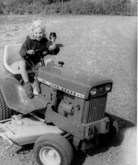 Marilyn on a yard tractor